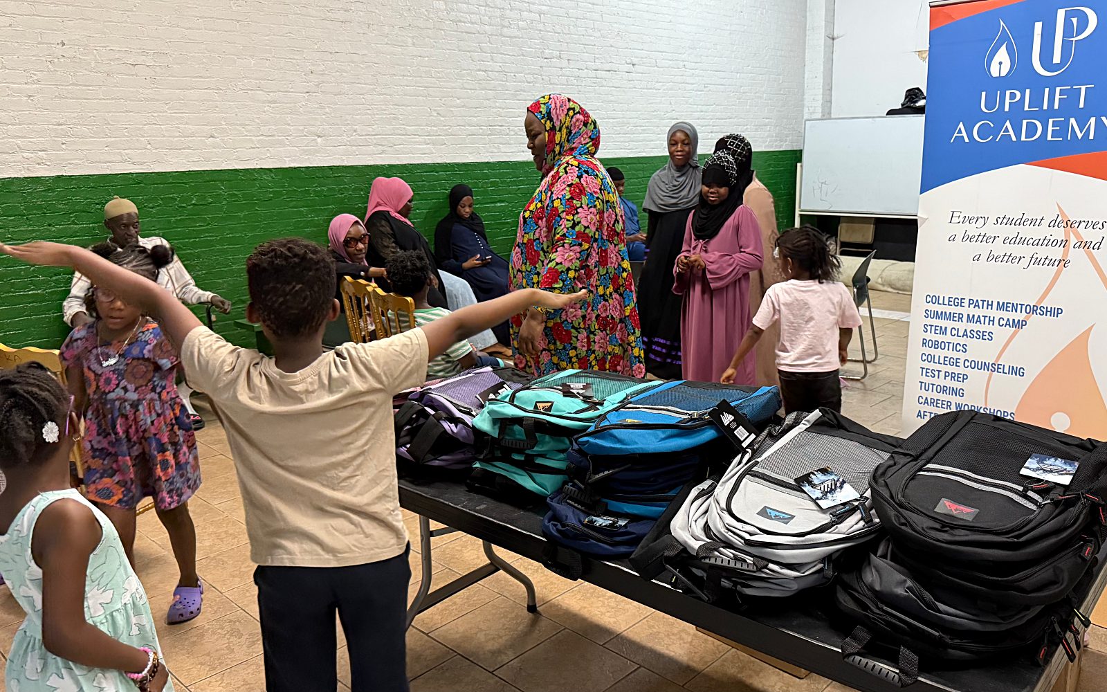 UPLIFT Distributes Backpacks to Prepare Students for Success